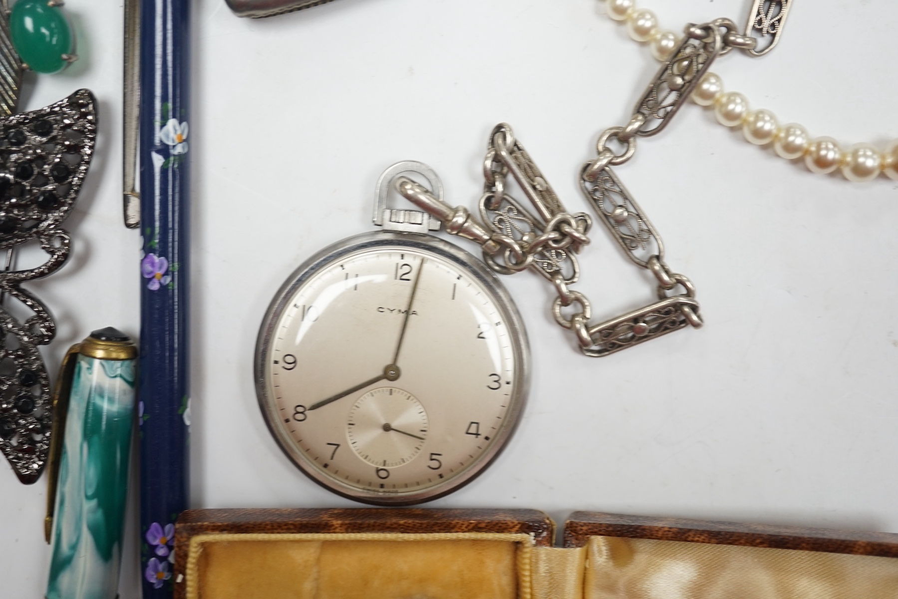 A mixed group of items including silver, white metal and costume jewellery, silver vesta case, silver mounted pepper mill, pens, Victorian mourning brooch, dress pocket watch, etc. Condition - poor to fair